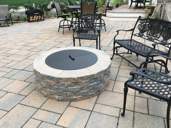 PitTTopper Round Fire Pit Cover Customer Photo Stone Fire Pit on Patio